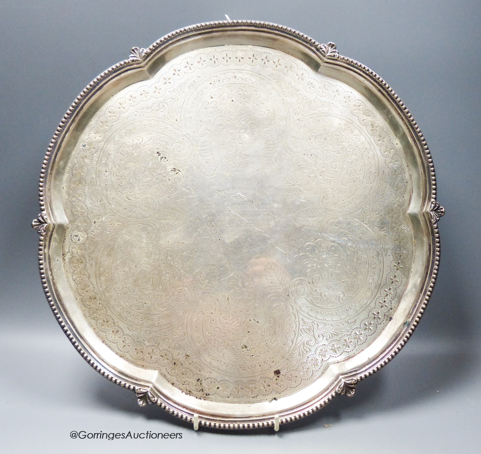 A late Victorian silver shaped circular salver, with engraved inscription, George Howson, Sheffield, 1896, 37.5cm, 40oz.